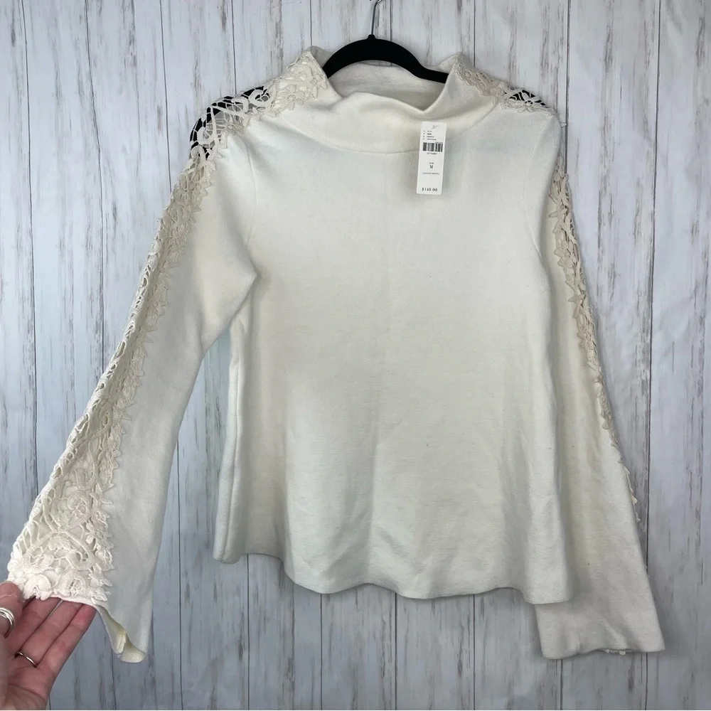 Anthropologie NWT knitted and knotted ivory crochet sweater Medium